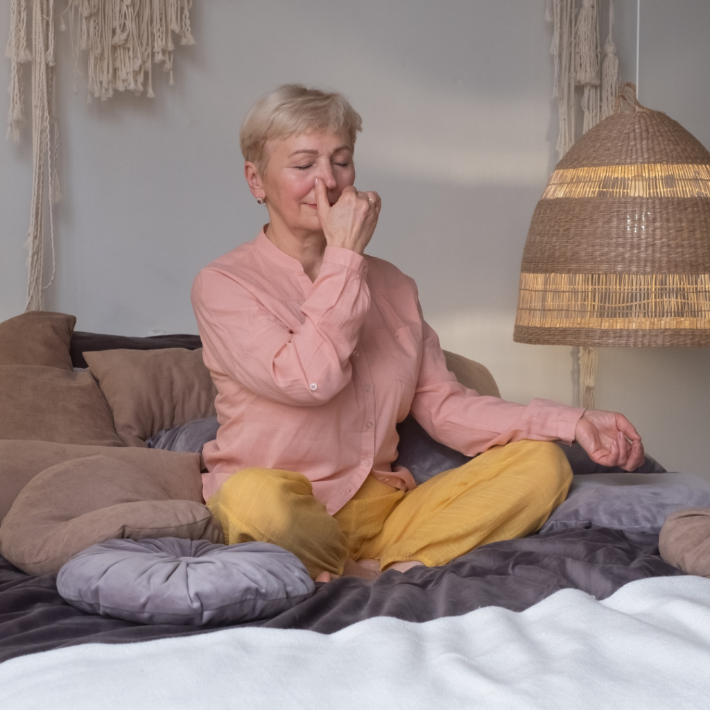 woman performing breathing exercises