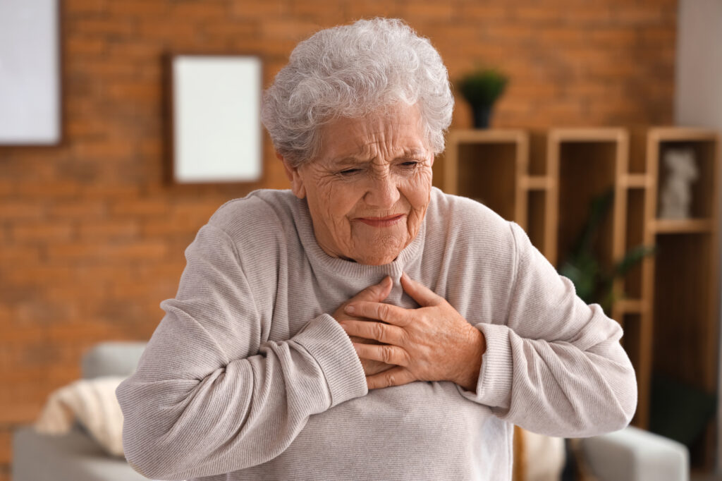 Ill senior woman at home, closeup