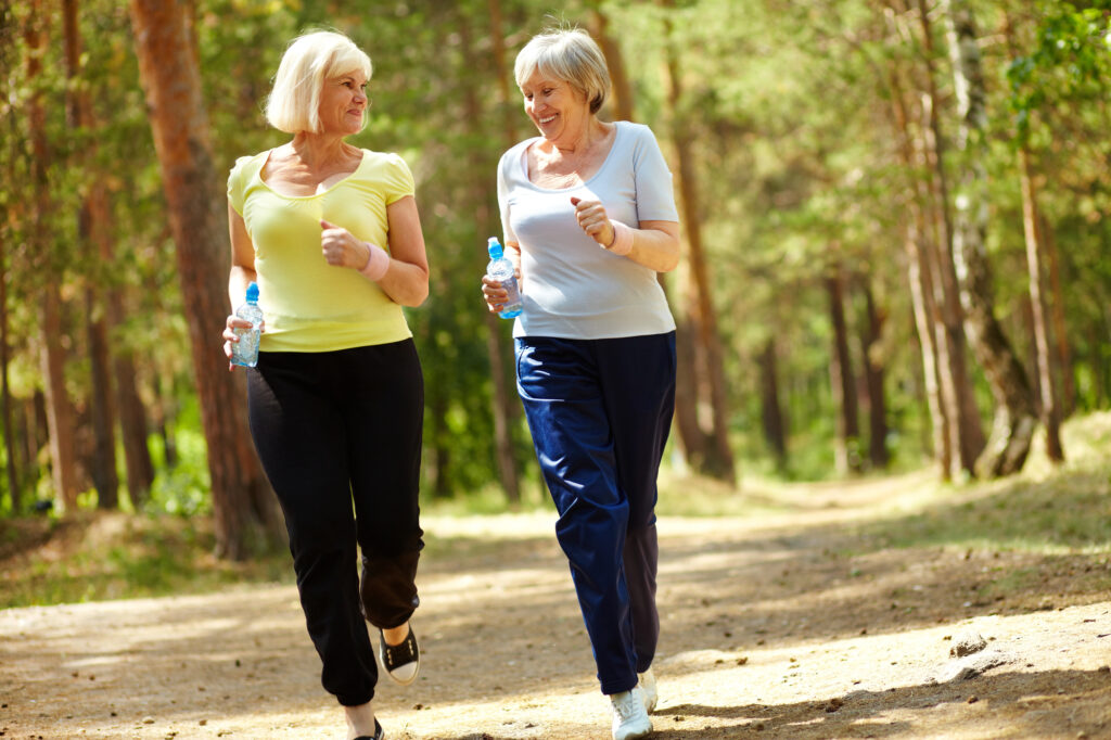 Senior women jogging in daytime